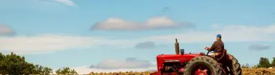 farmer on tractor - Photo by Nicolas Barbier Garreau on Unsplash