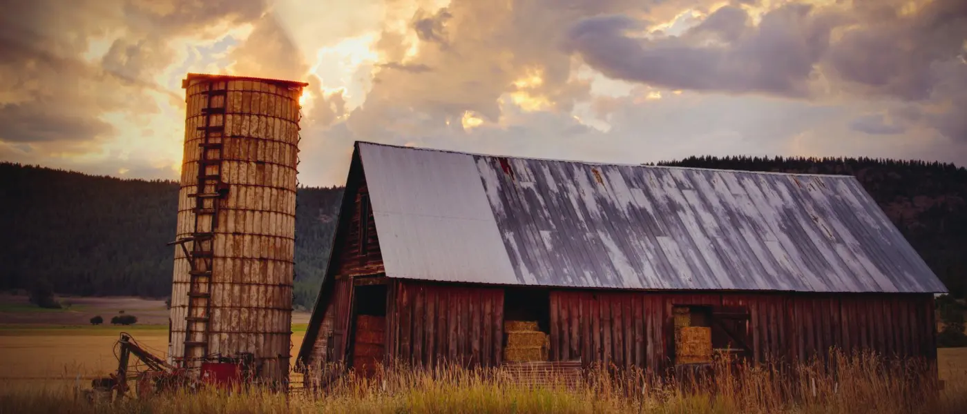 Morning sunrise over an old barn