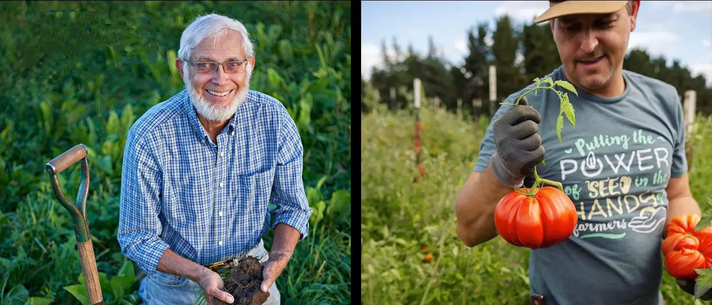 two farmers holding soil and tomatoes, respectively