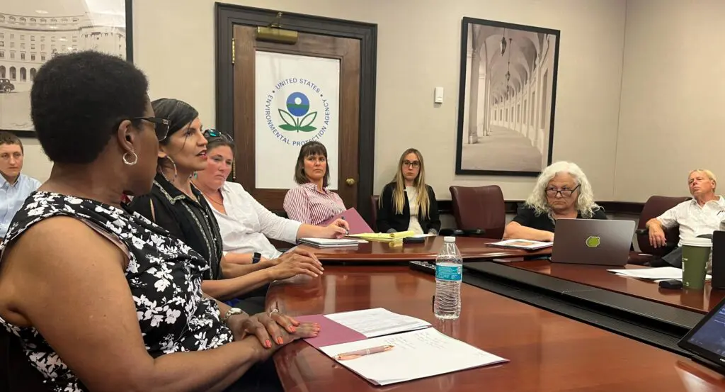 activists seated around a table at the Environmental Protection Agency