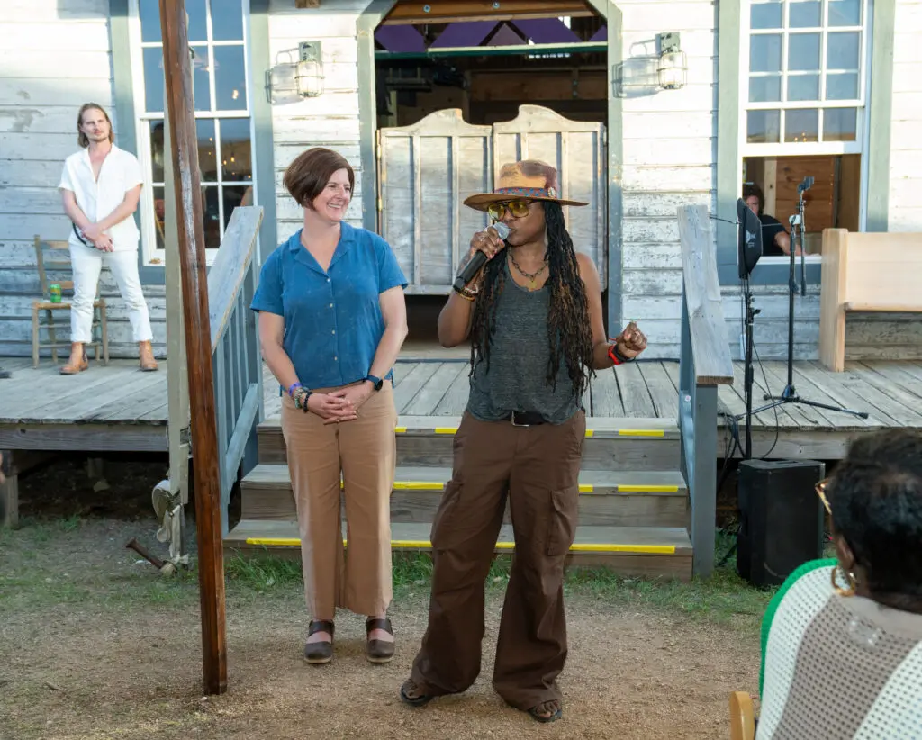 two women addressing a crowd