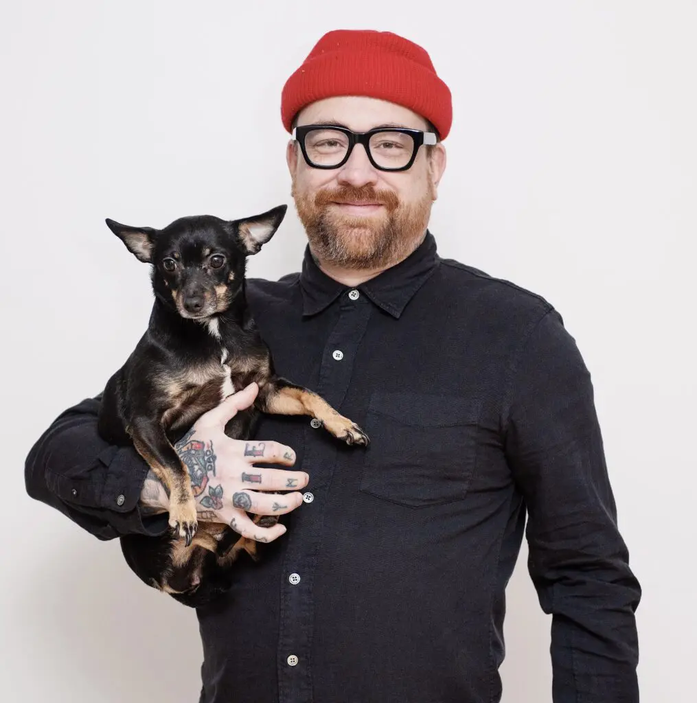 Chef BJ Smith holding a dog