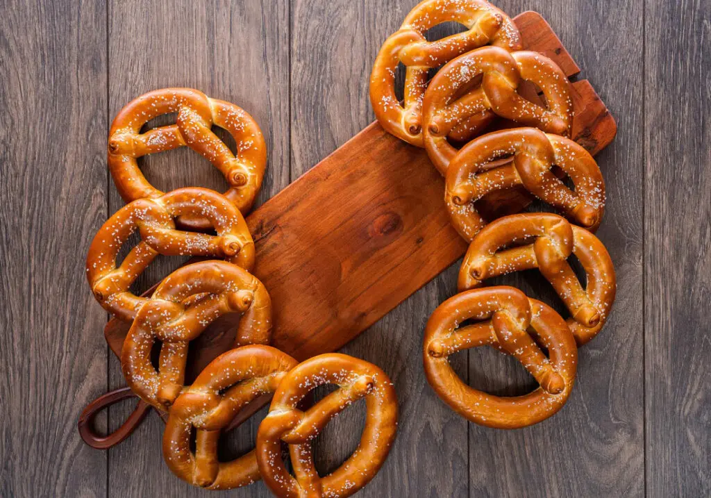 ten pretzels on a serving board