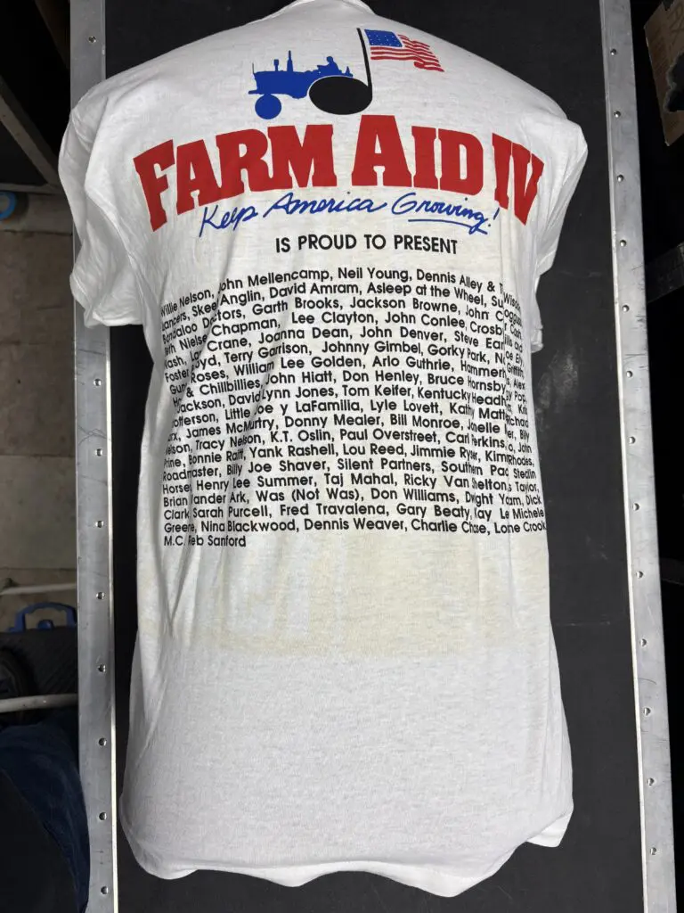 back of a Farm Aid IV t-shirt listing the lineup