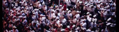 crowd in white caps