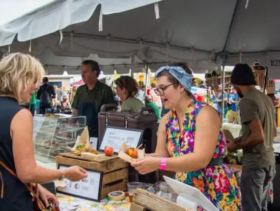 Person at festival getting food