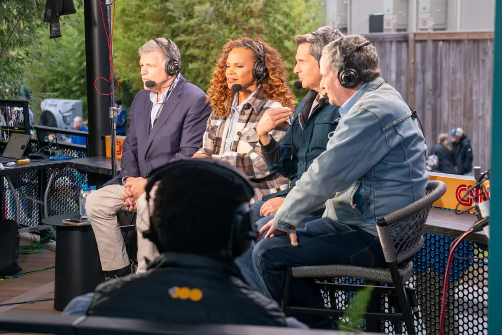 CNN anchors doing a live broadcast of Farm Aid 2026