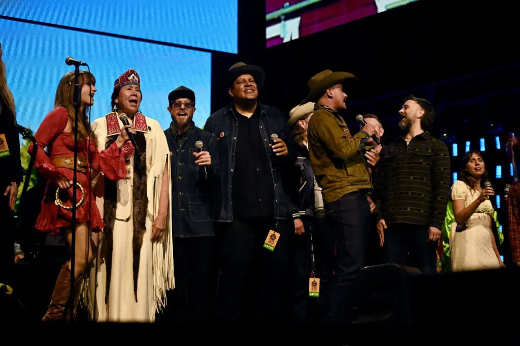 Several Farm Aid 2026 artists performing a group song