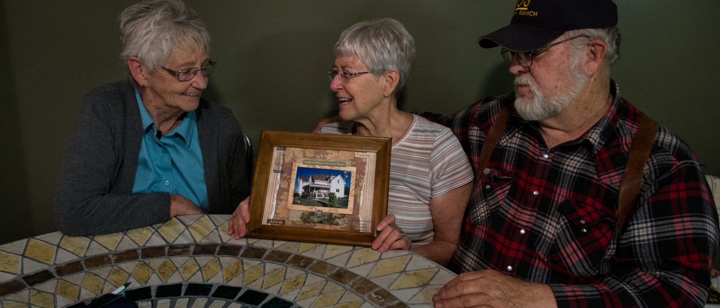 Linda Hessman and a farm family she worked with in the 1980s