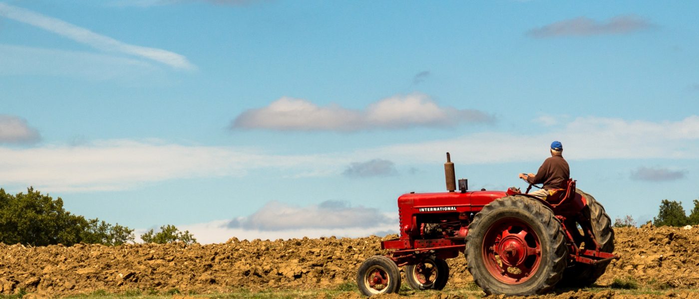farmer on tractor - Photo by Nicolas Barbier Garreau on Unsplash