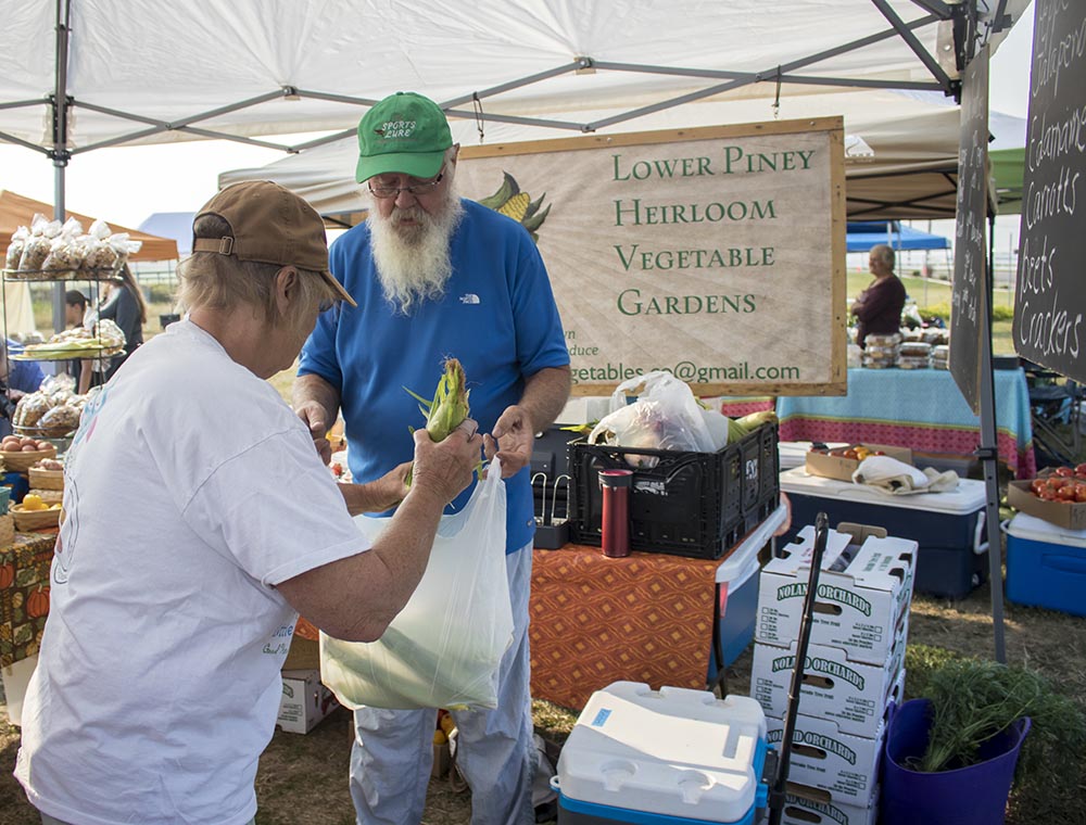 Rachel and Luc Bourgault at a farmers market