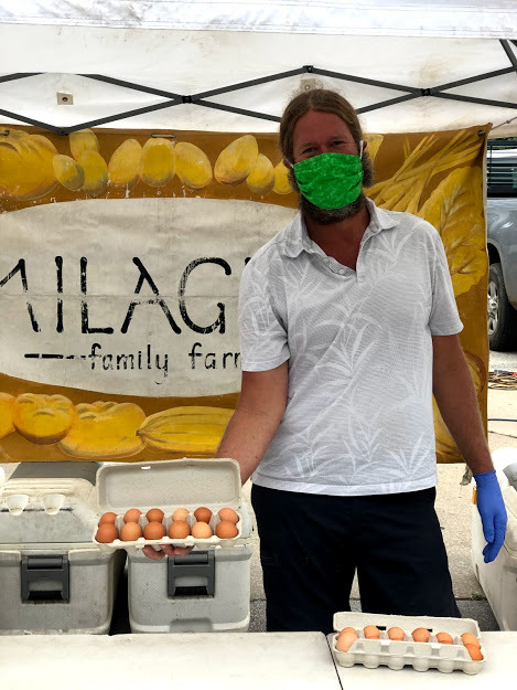 Farmers Market vendor wearing a mask