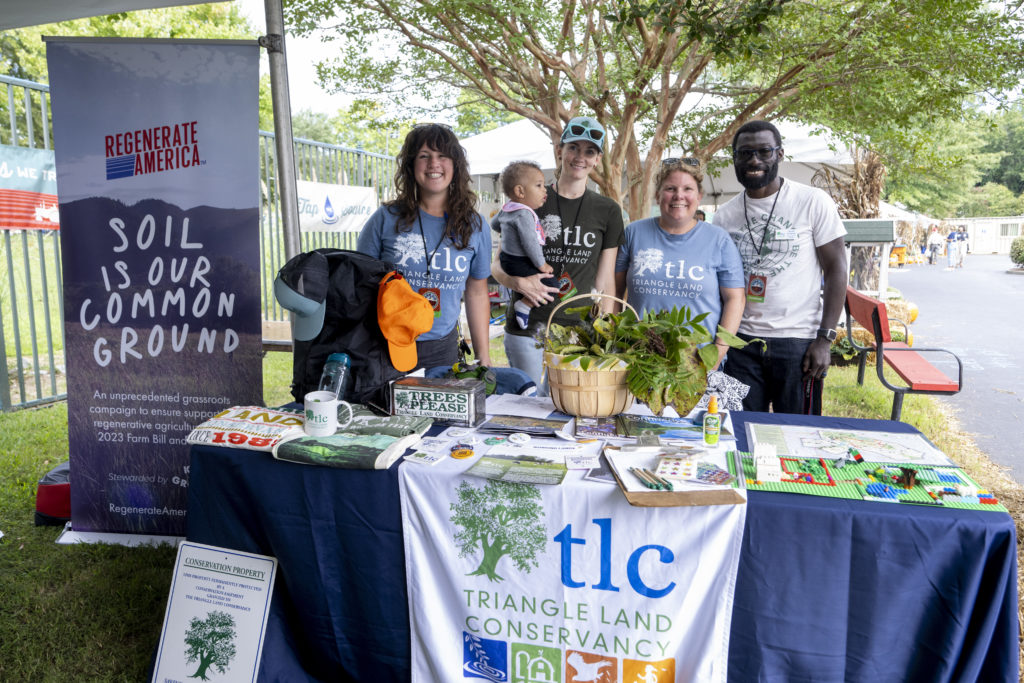 Triangle Land Conservancy table at Farm Aid 2022