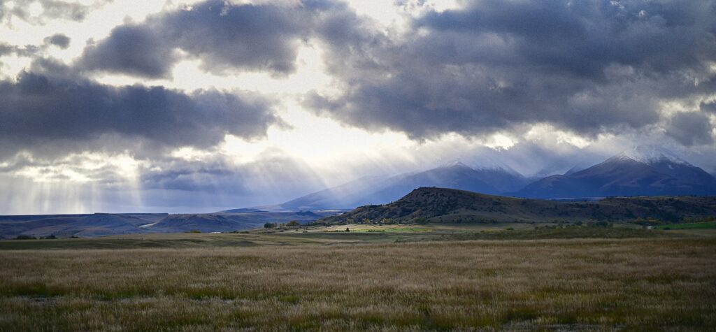 beautiful Montana landscape with hills and a field