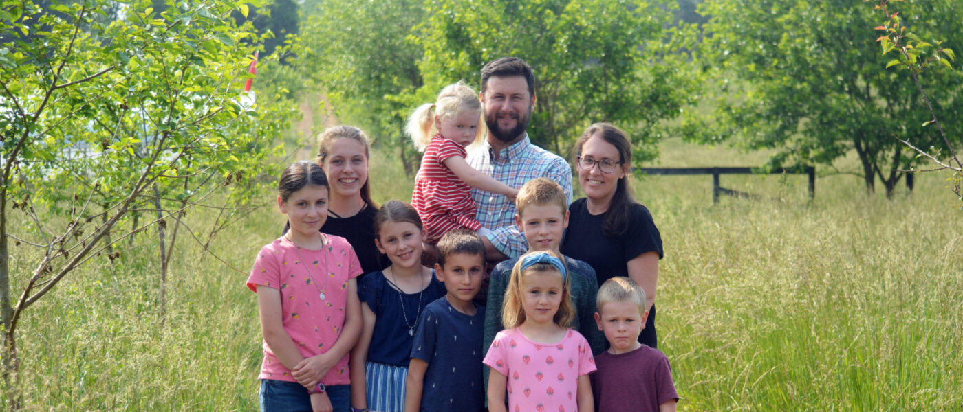 family posing for a portrait