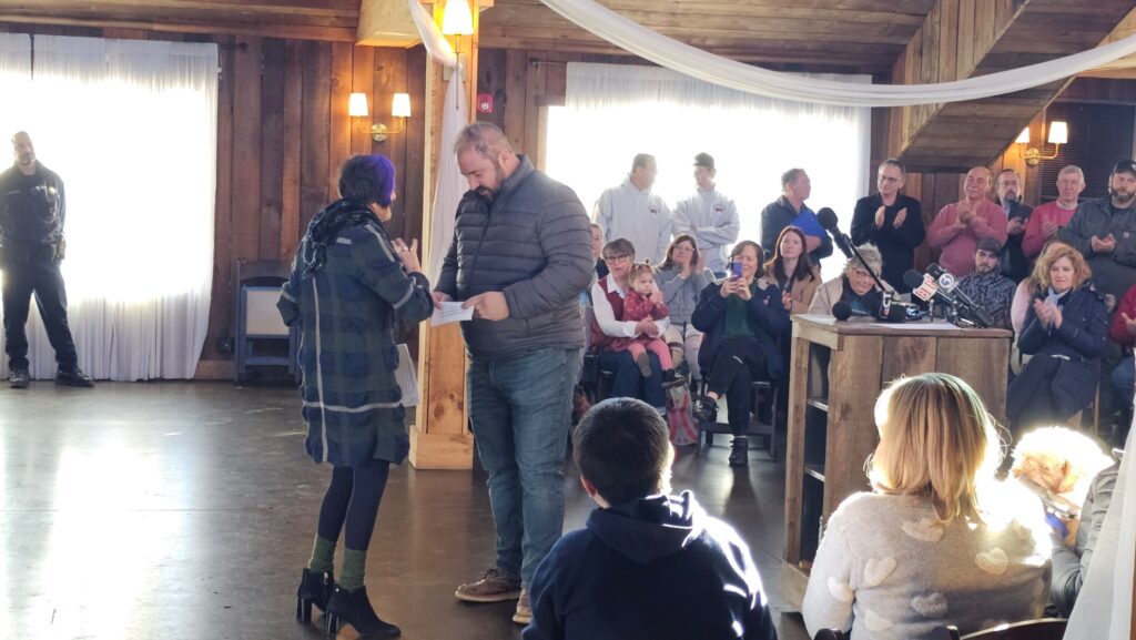 Will Dellacamera handing the mic off to Rep. Rosa DeLauro (D-CT)